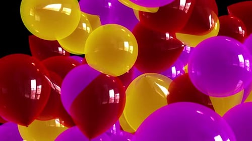 Bunte Luftballonsammlung auf schwarzem Hintergrund