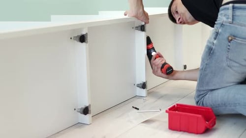 Professional furniture assembling. Installation of new furniture. Furniture assembly. 4k footage.