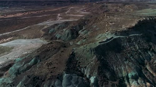 Beautiful aerial footage of canyons full of red rocks in utah