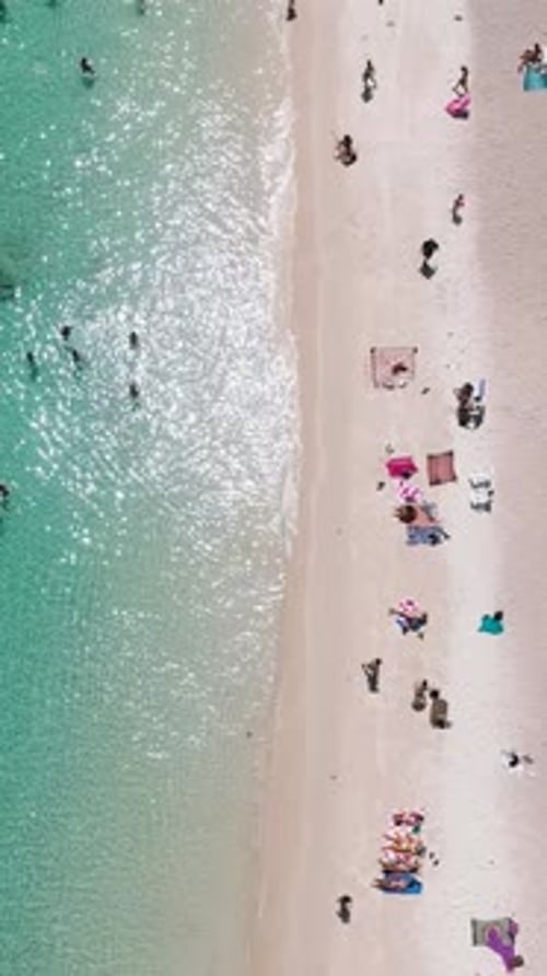 Bright Beach and Swimmers in Turquoise Sea Ao Leuk Koh Tao Thailand