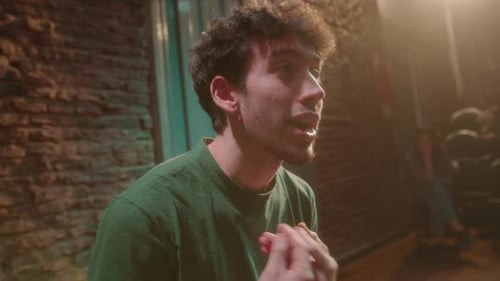 Two Actors Having Dramatic Dialogue during Rehearsal in Theater