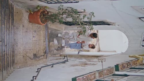 Relaxed Newlyweds Strolling Stairs Old Town Vertically Girl Guy Walking Street