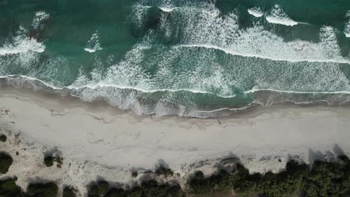 (Top view) Aerial view drone over beach sea with beautiful sea waves. Beach sand and amazing sea. Sa