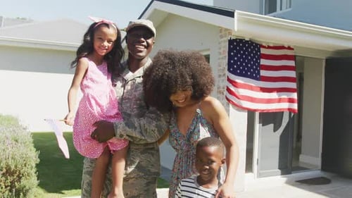 Video of african american family holding usa flags
