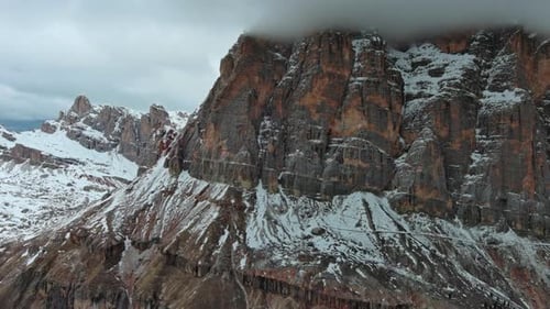Rocky Snow Mountains and Clouds