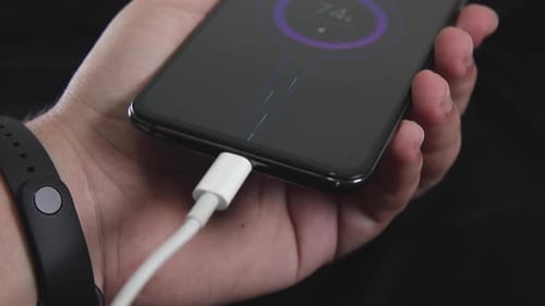connecting charging cable to cell phone