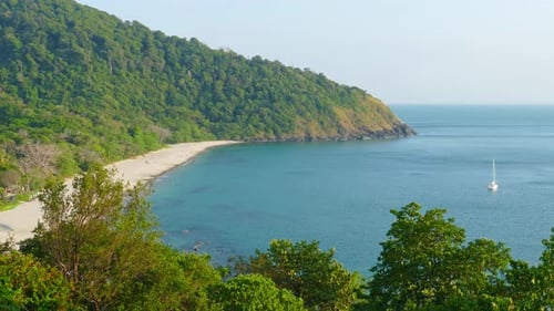 Beautiful Landscape with Secluded Beach and Yacht