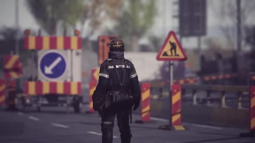 Construction Worker Monitoring Road Safety in a Busy Urban Area