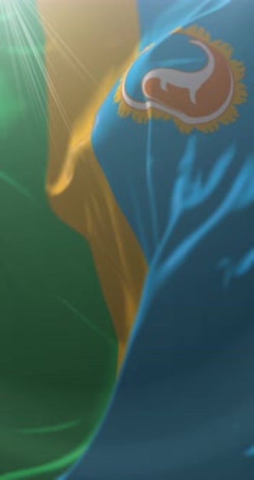 Realistic Waving Flag with Animal Emblem and Radiant Sunlight