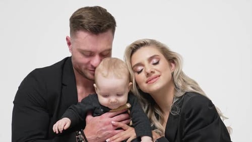 Loving Family Portrait on White Background