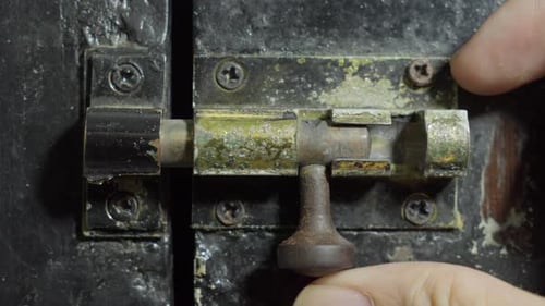 Hand Locking Sliding Old Rusty Door Latch Lock, Close Up