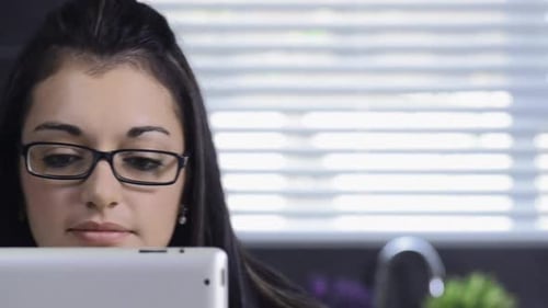Woman with Tablet in Home Interior