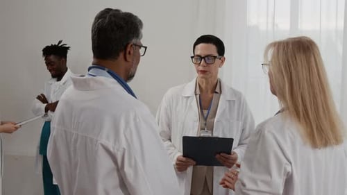 Medical Professionals Talking in Hospital