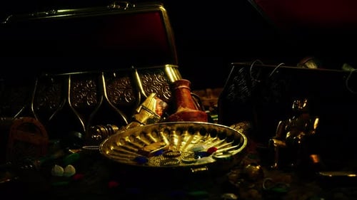 Open Old Wooden Chest with Many Treasures