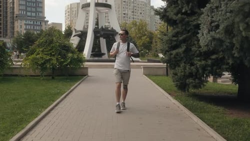 Man Walking In Park