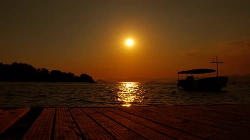 Fishing Sailboat Silhouette By Wooden Pier