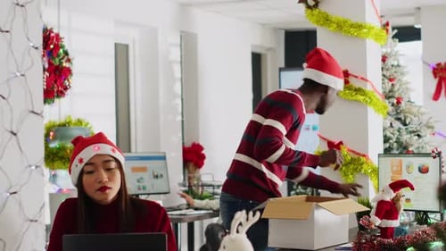 Worker Clears Desk Leaves for Holiday