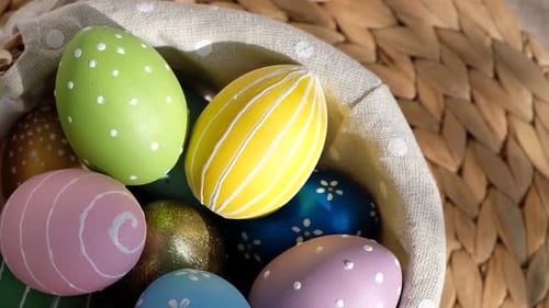 Colorful Decorated Easter Eggs in Basket