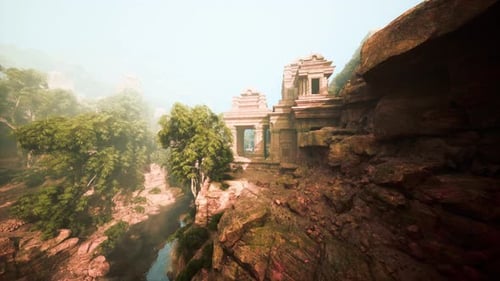 Sunrise Illuminates Ancient Temple Set in Misty Jungle Landscape