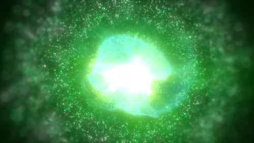 A glowing green nebula sphere with a white core, surrounded by sparkling particles