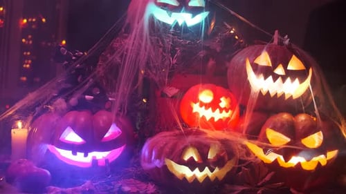 Eerie Halloween Pumpkins Glowing in the Night