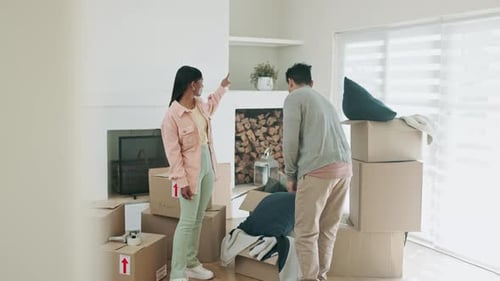 Young Couple Unpacking in New Home