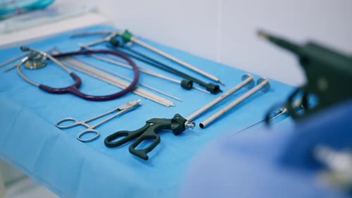 sterile surgical instruments lie on the table before the operation in the operating room laparoscope