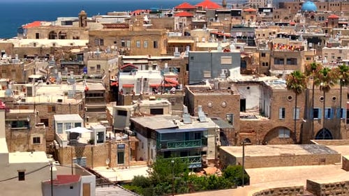 Acre old city rooftops with Mosque domes and church towers
