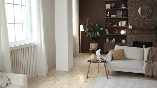 Modern Stylish Spacious Living Room with Beige Sofa Large Windows Brown Wall Wooden Floor Fireplace