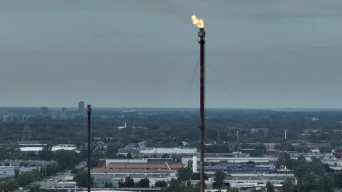 Aerial view of flames at an oil and gas refinery_1