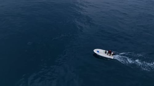 Old Fisherman Spreads His Fishing Nets in the Sea Near the Shore Aerial View Background
