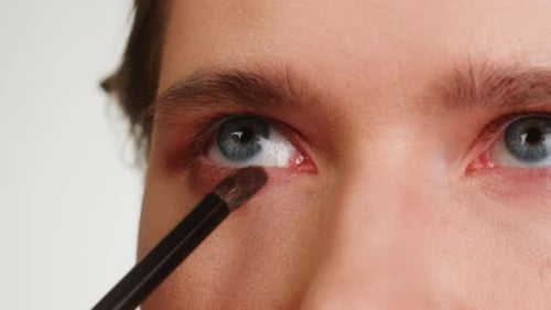 Beauty Shot of Woman Makeup Artist Applying Foundation Bb Cream on Previously Applied Moisturizing