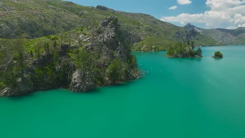Aerial Video of People Riding SUP Boards in Canyon