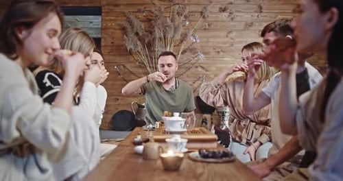 Group of Friends Takes Small Cups Drinking Beverage in Cafe