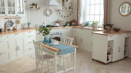 Modern White Scandinavian Kitchen with a Wooden Worktop Filled with Kitchen Accessories Stylish