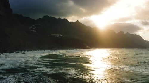 Powerful Ocean Waves Crash on Rocky Volcanic Beach