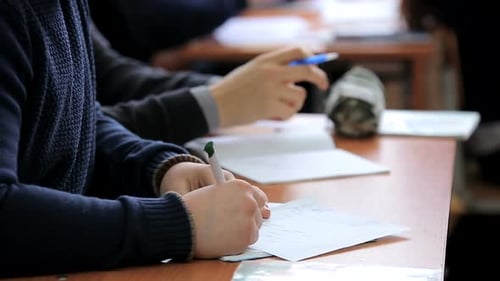 High School Teenage Students at the Desk