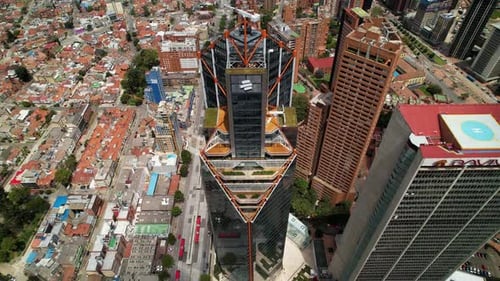 Aerial panning down shot of a bank building in Bogota City at Colombia