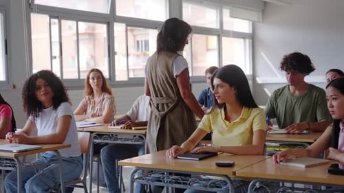 Teacher with Students in Class Learning Together