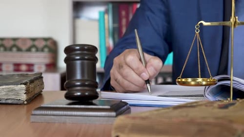 Attorney Working with Gavel and Scales of Justice