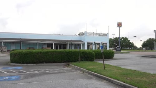 Abandoned Mall. Panning through the various buildings and shops.