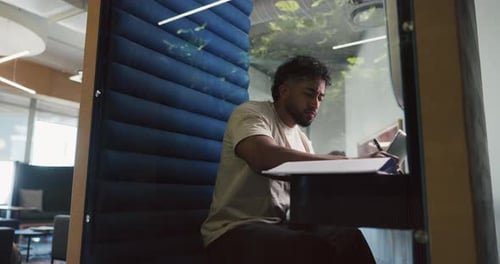 Writing, man and tablet in office pod for research notes, editor feedback and article planning