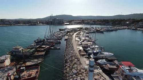 Fishing shelter and boats on the pier.