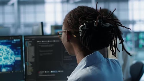 Woman Programming in AI Data Center Close Up