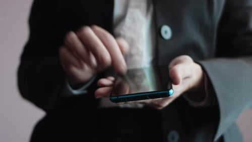 Portrait Young Businesswoman in Black Suit Using Smartphone