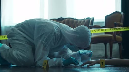 Forensic Scientist Collects DNA Samples at Crime Scene