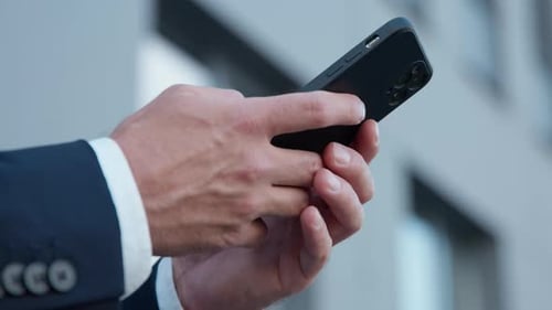 Closeup Male Hands Holding Mobile Phone in City Unrecognizable Business Man Chatting with Smartphone