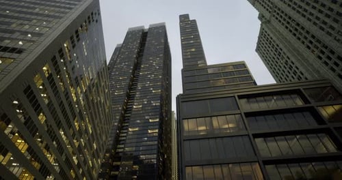City Skyline Showcasing Modern Skyscrapers at Dusk in an Urban Environment