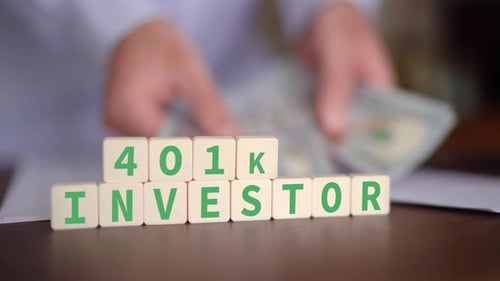 Concept of investing in your 401k retirement account. Selective focus with man counting cash in the