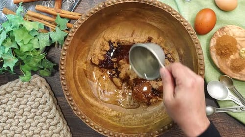 Adding Ingredients to Bowl Overhead Cooking